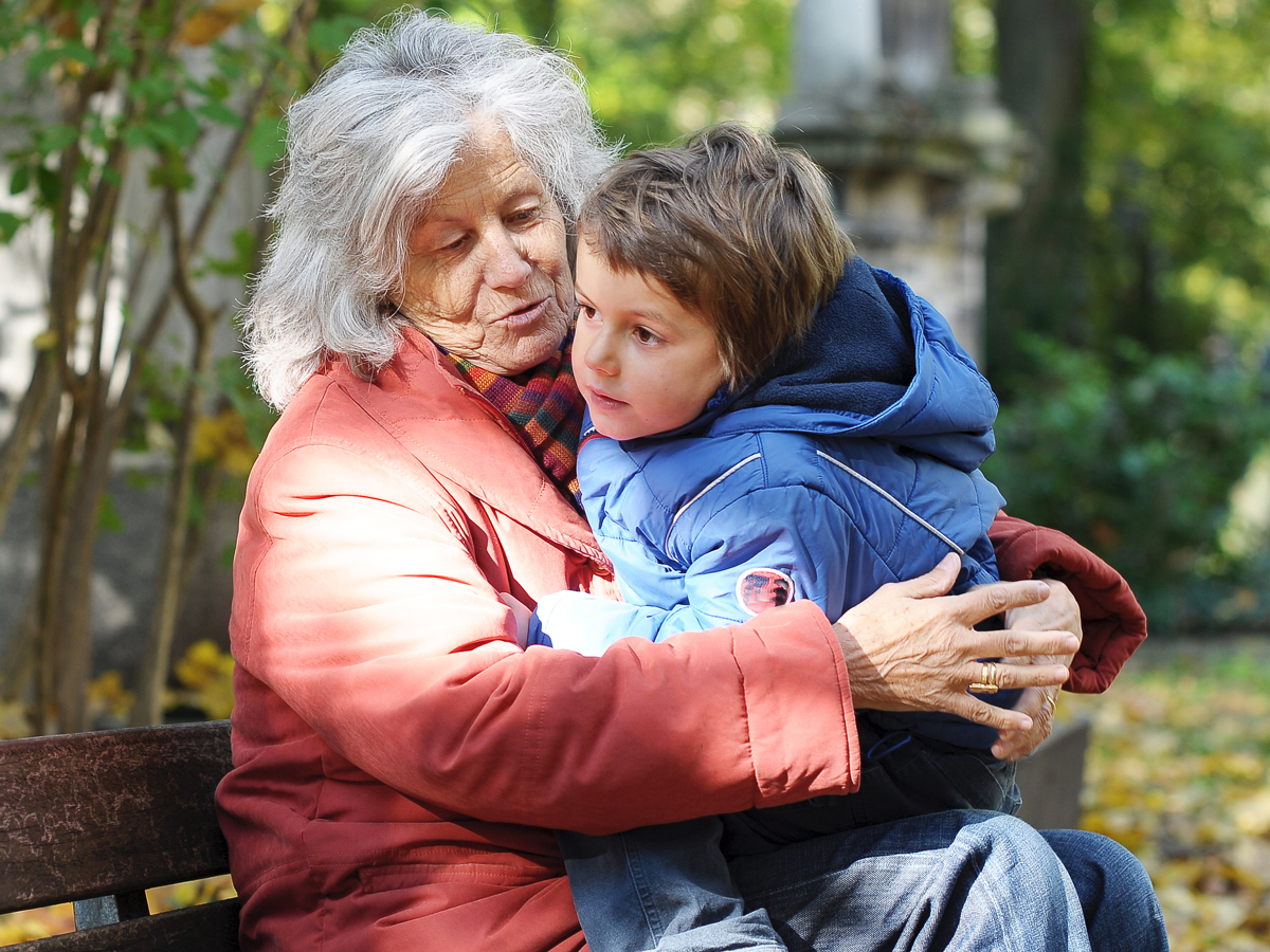 woman holding young boy