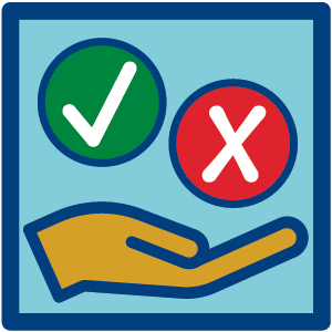 Hand holding a checkmark and an x