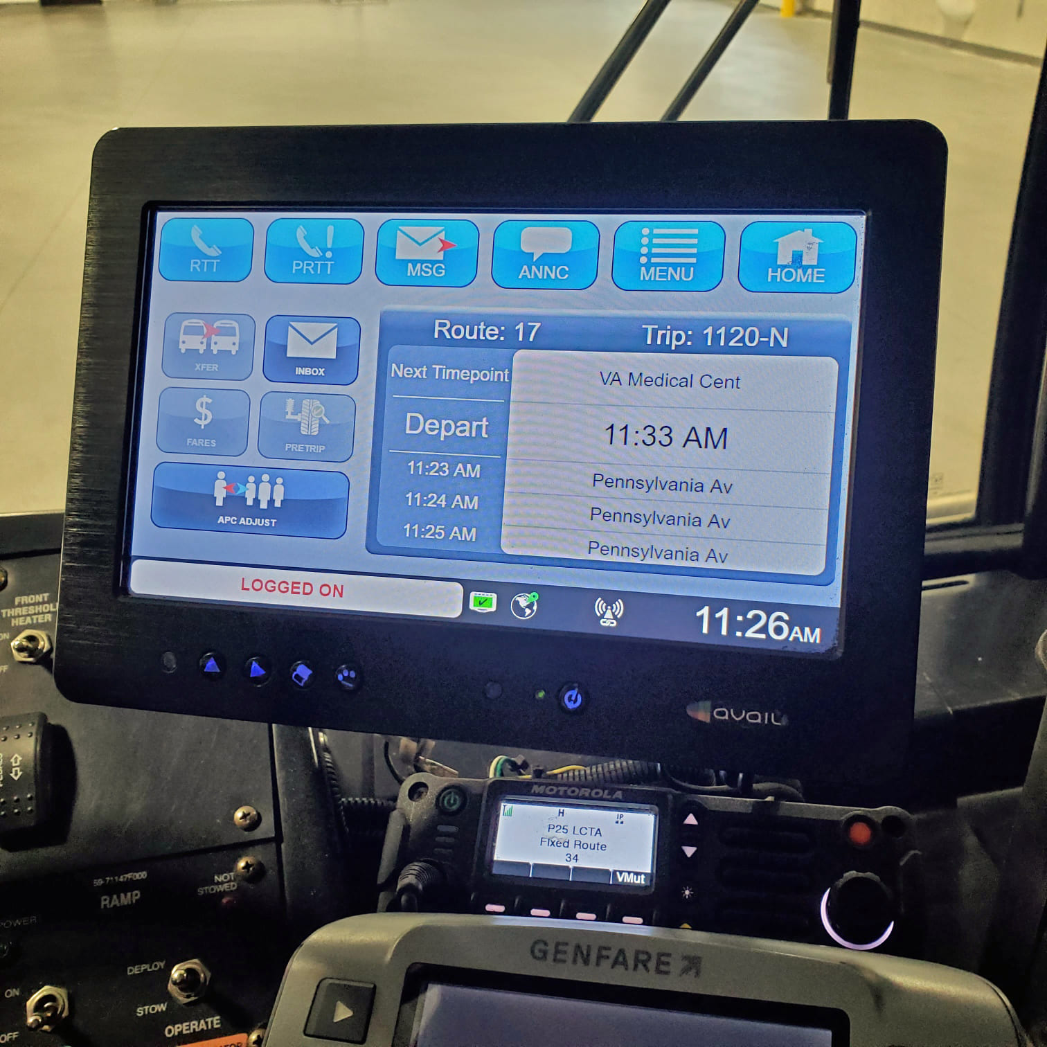 An image of a screen inside a transit bus show trip information including the route and departure times from each location on the route. 
