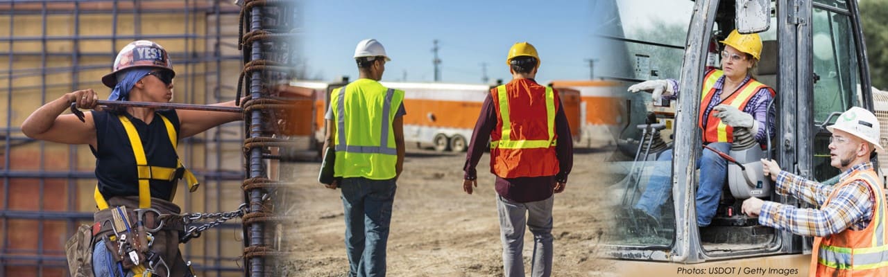 A group of 11 individuals stand in front of a yellow PennDOT dump truck in a parking lot.