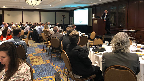 regional innovation day attendees listening to speaker