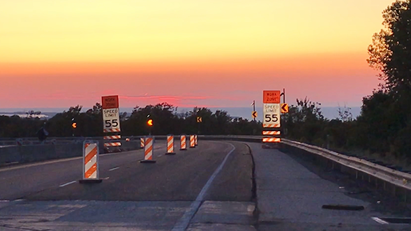 Road with speed limit signs