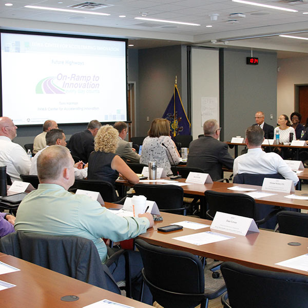 STIC attendees at a business meeeting.