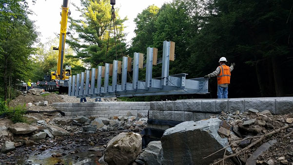 Newly constructed bridge over a creek.
