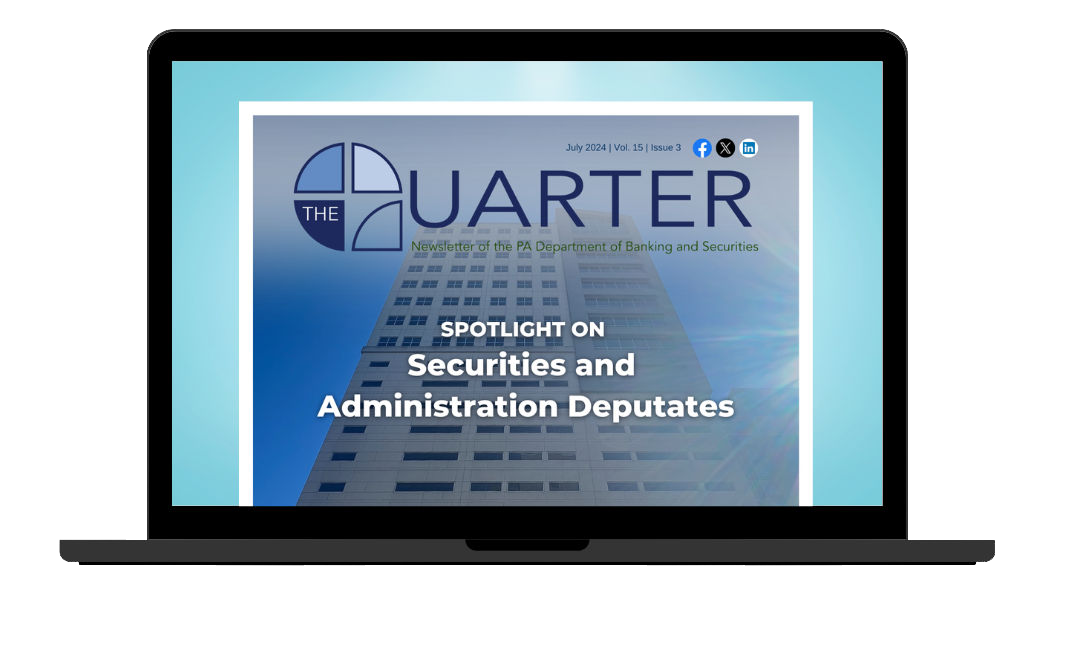 Laptop showing a screenshot of The Quarter, DoBS's newsletter